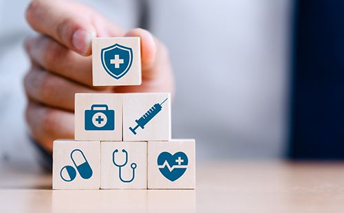 Stacked Blocks with Health Benefits Icons
